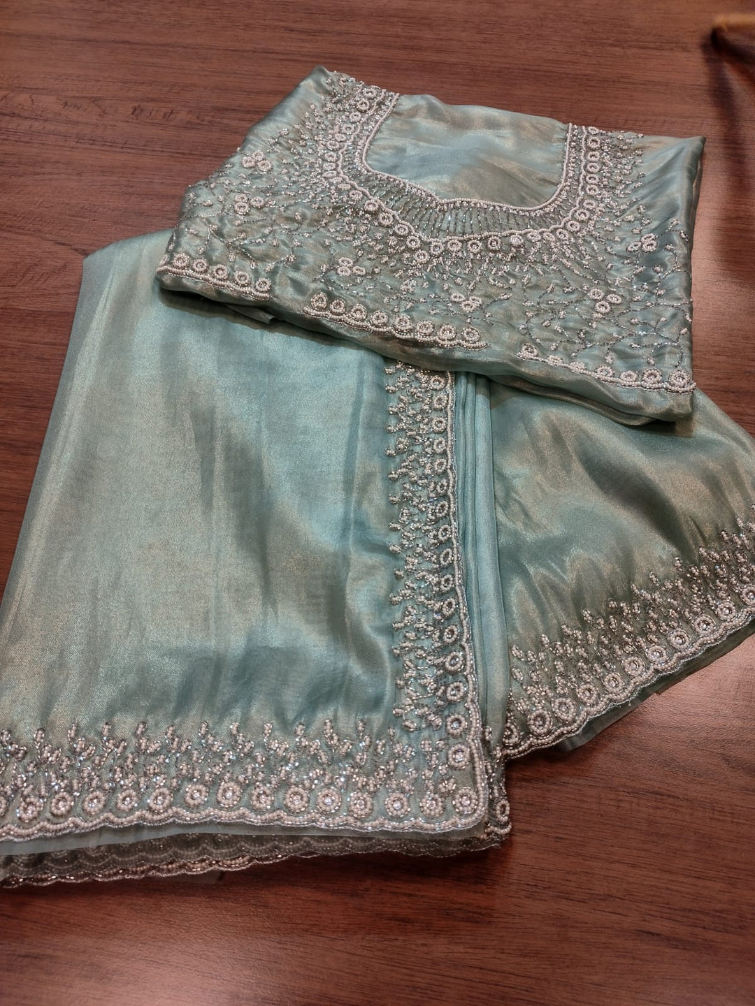 Mingle With Single Color Tissue Organza Saree(Powder Green)