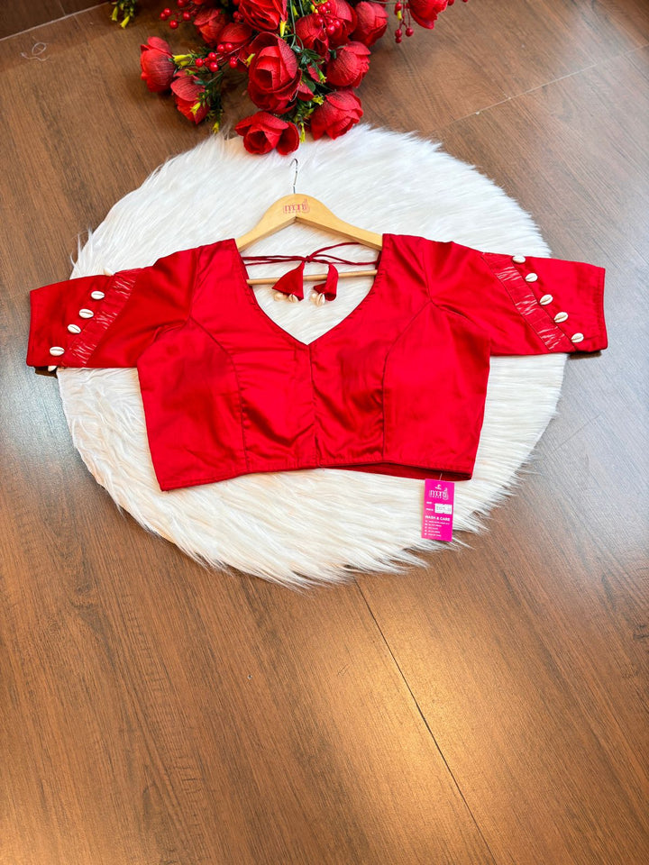 New Direction- Red Designer Blouse With Cowrie shells