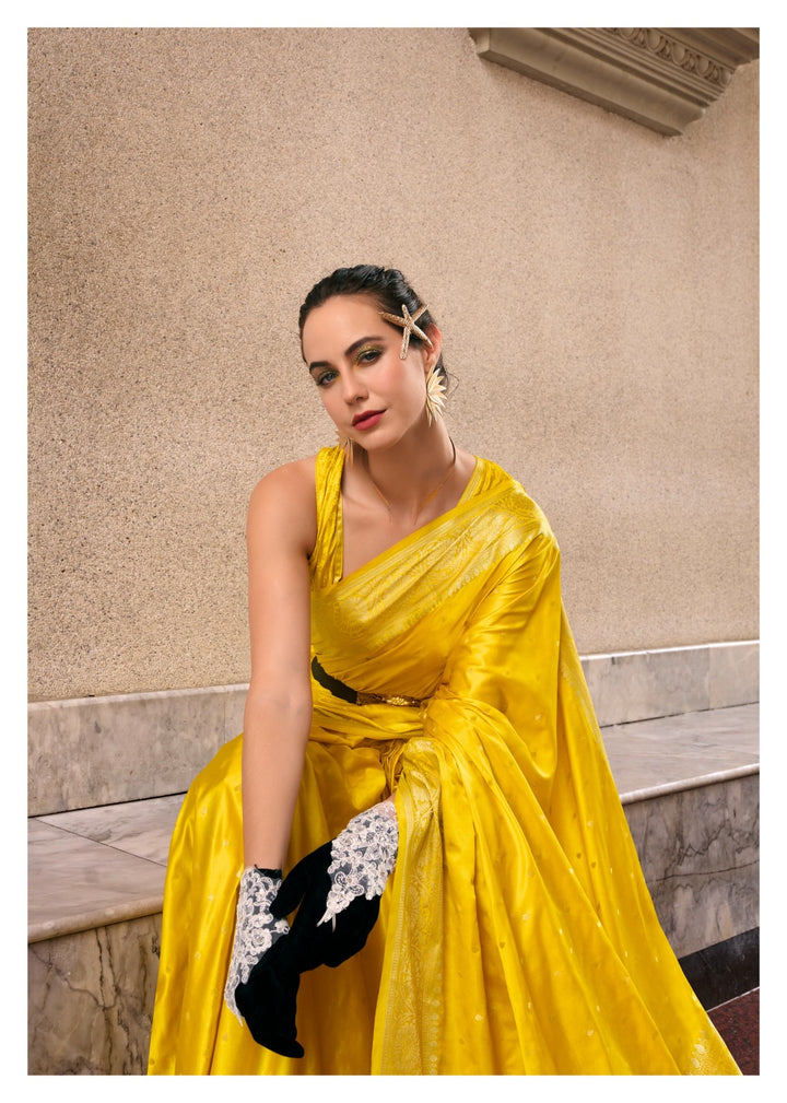 A single Bloom Yellow Muga Silk Saree