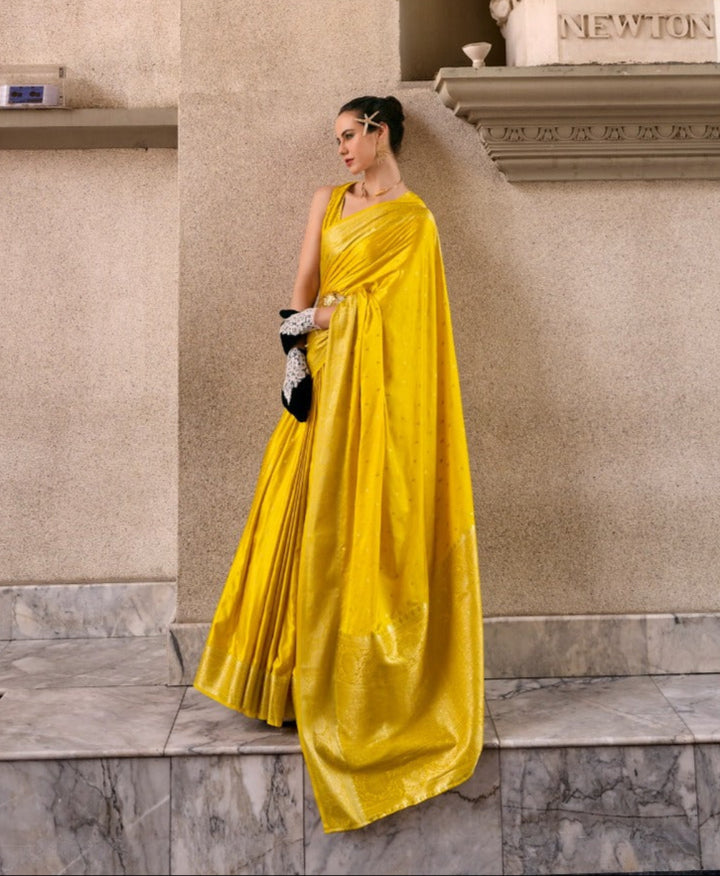 A single Bloom Yellow Muga Silk Saree