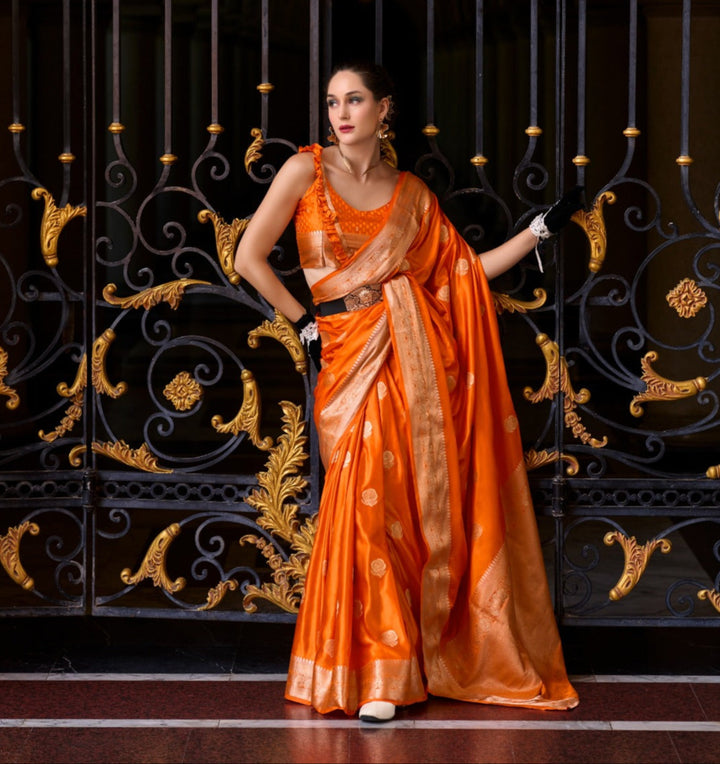 A single Bloom Orange Muga Silk Saree