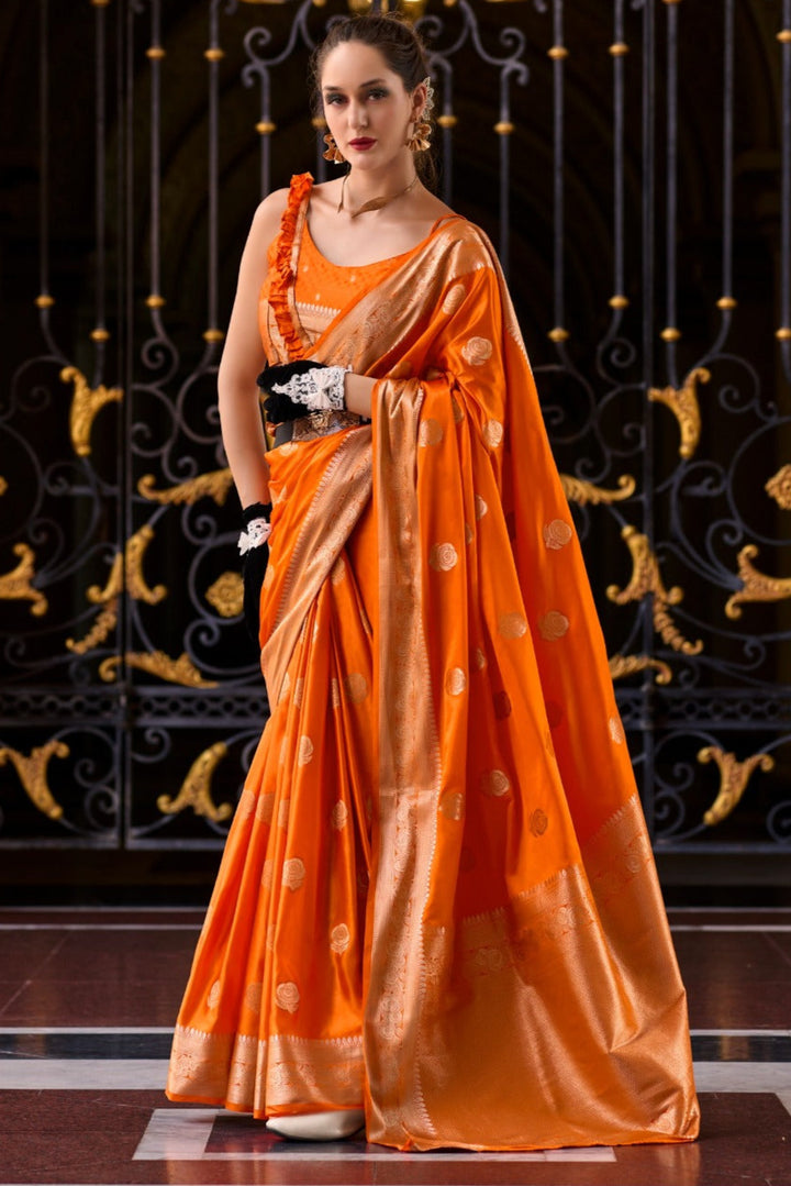 A single Bloom Orange Muga Silk Saree