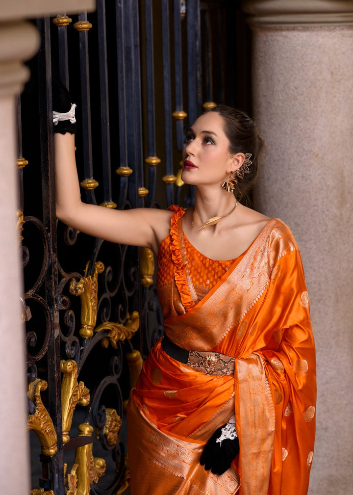 A single Bloom Orange Muga Silk Saree
