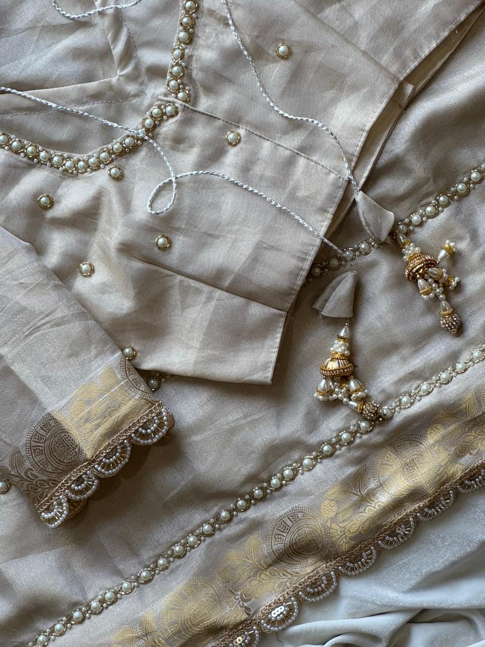 Quiet Devotion Partywear Tissue Silk Saree