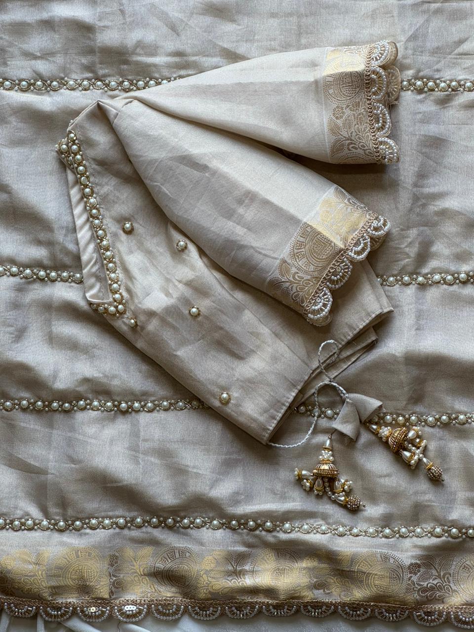 Quiet Devotion Partywear Tissue Silk Saree