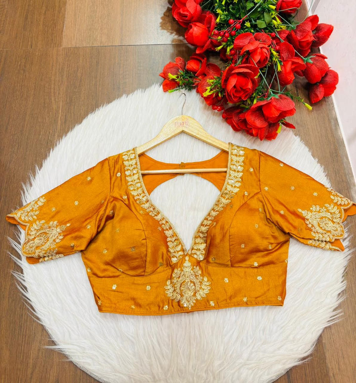 The Empress Glow V-Neck Blouse