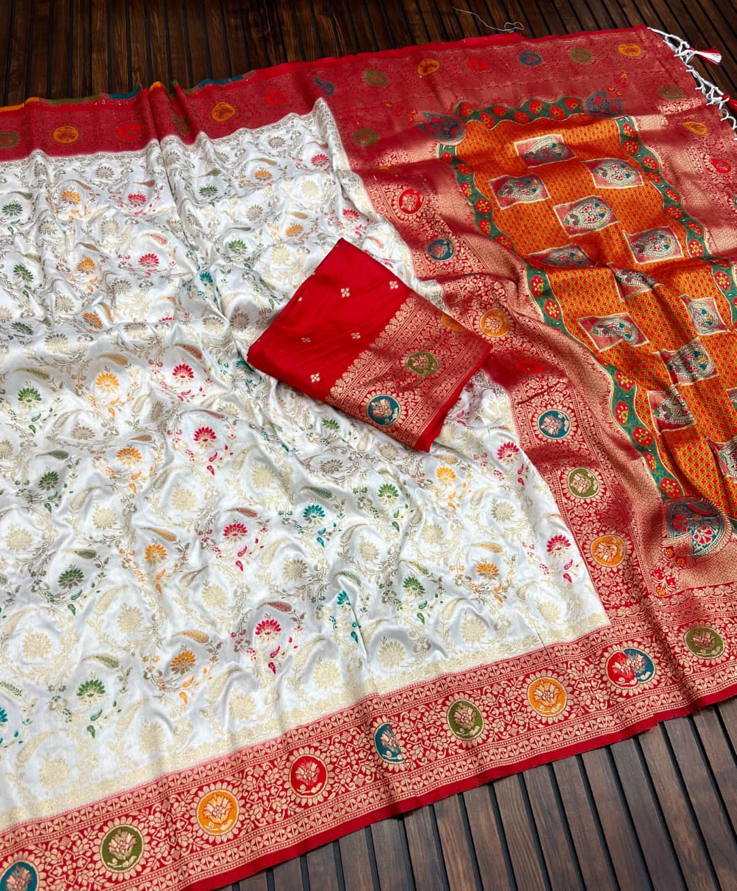 Shubho Shree Premium White Banarasi Silk Saree with Rich Red Border & Multicolor Woven Motifs